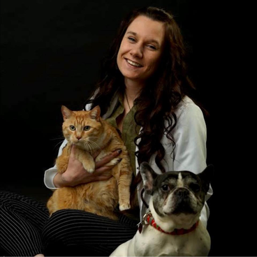 Dr. Hannah Lehmann with a cat and a dog
